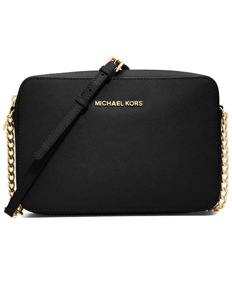 michael kors jet set travel black|Michael Kors flight crossbody bag.